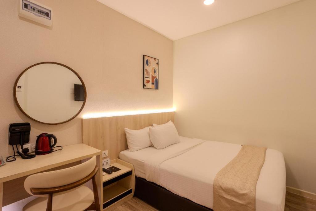 Innspire by Suntai (Previously known as WG Hotel)にあるベッド