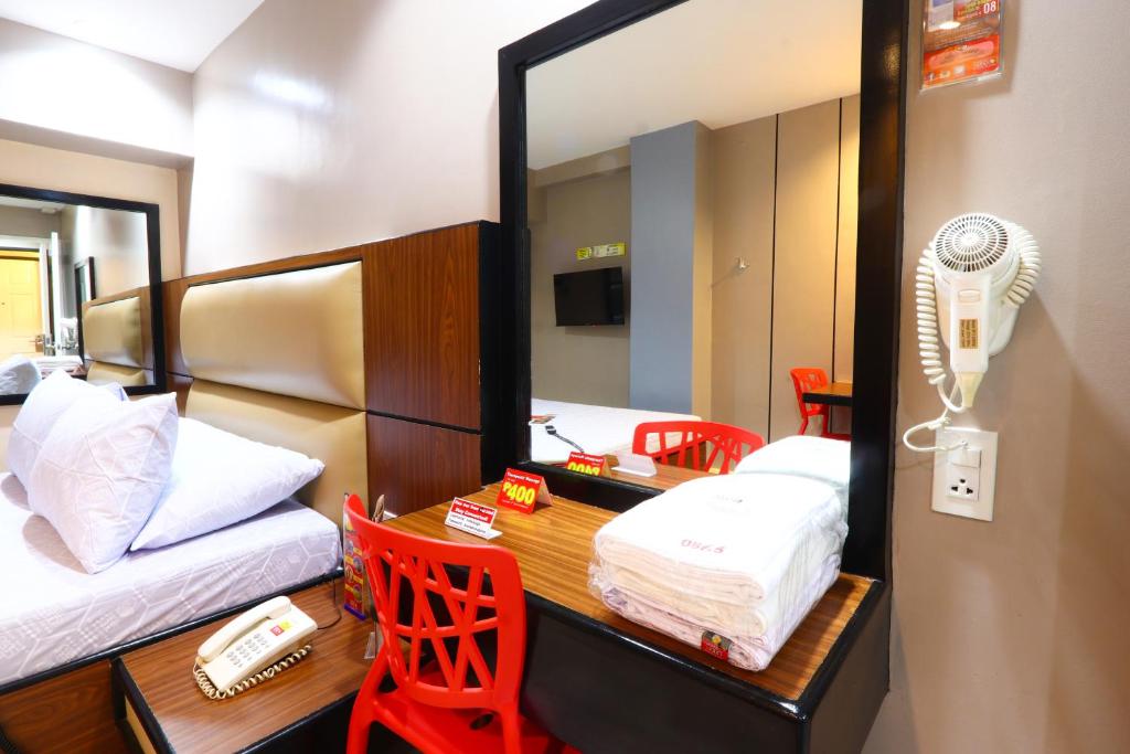 Postel nebo postele na pokoji v ubytování Hotel Sogo - Pasay Rotonda