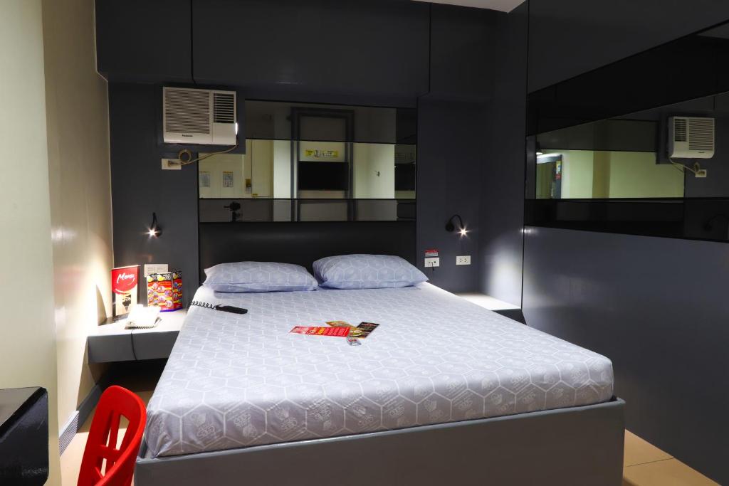 Postel nebo postele na pokoji v ubytování Hotel Sogo - Pasay Rotonda