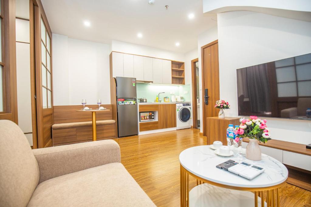 Kuchyňa alebo kuchynka v ubytovaní Sumitomo Apartment - Linh Lang street