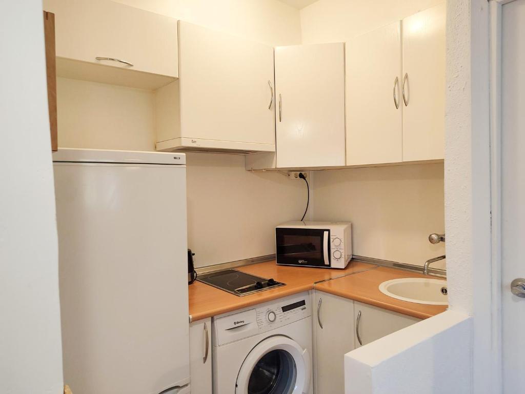 Kuchyň nebo kuchyňský kout v ubytování Apartamentos 3000 Formigal