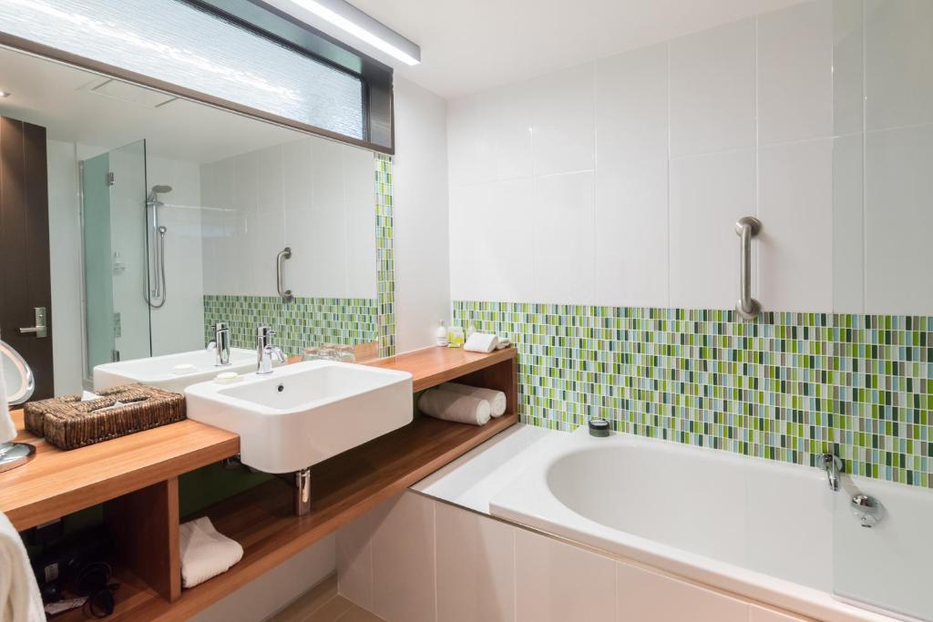 Koupelna v ubytování Legacy Te Waonui Hotel Franz Josef
