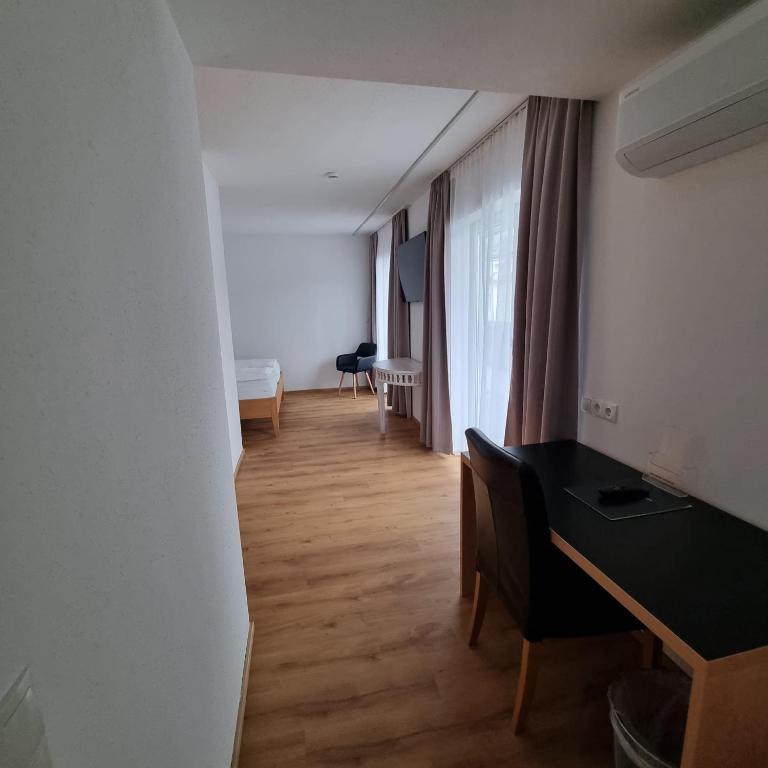 TV a/nebo společenská místnost v ubytování Hotel Central