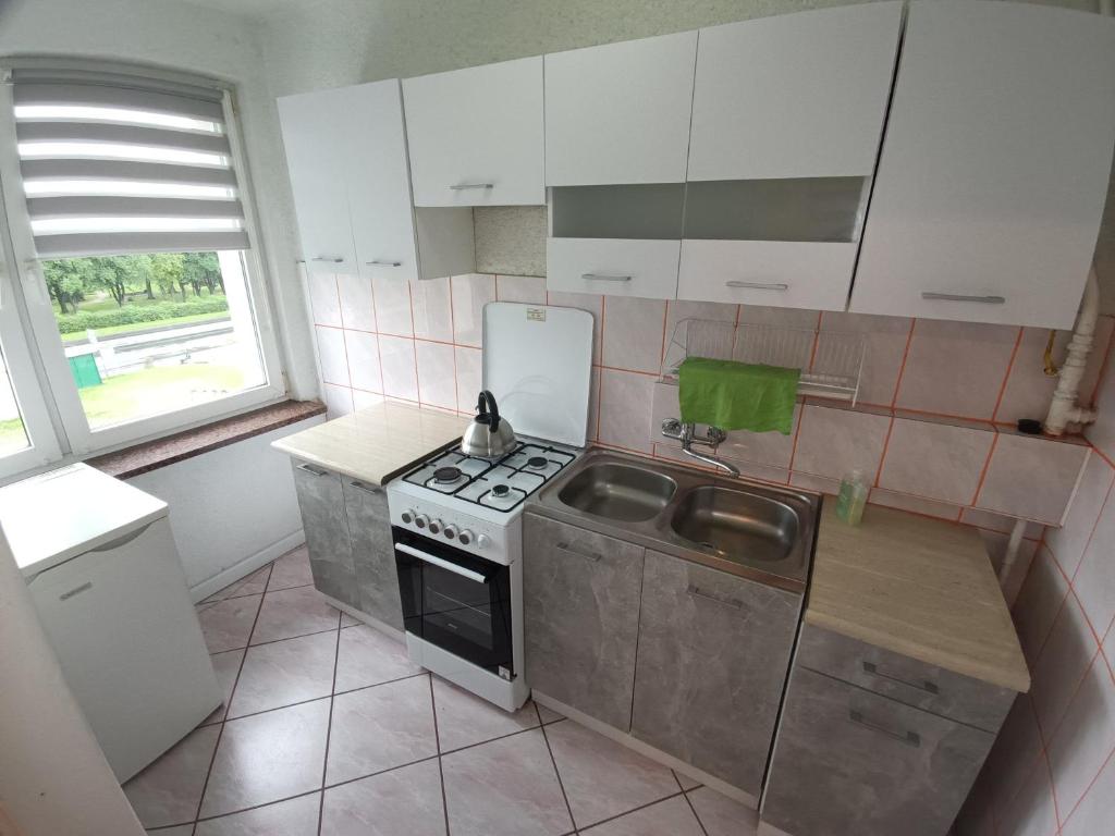Kuchyňa alebo kuchynka v ubytovaní Apartament Dzierżoniów
