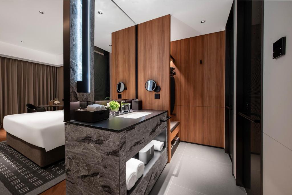 Xi'an Ancient Ming City Wall Premium IntercityHotel客房内的一张或多张床位