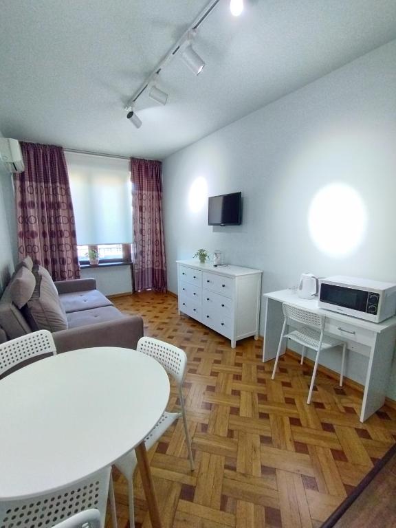TV a/nebo společenská místnost v ubytování Davka Apartments