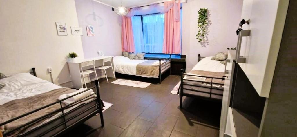 Postel nebo postele na pokoji v ubytování Good Vibes HOSTEL