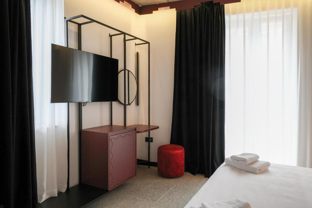 Postel nebo postele na pokoji v ubytování Bazaar Hotel