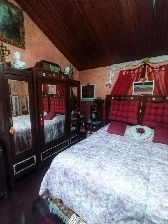 Posteľ alebo postele v izbe v ubytovaní Art B&B La Casa del Pittore