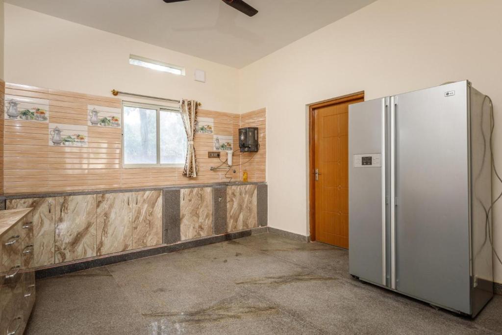 Kuchyň nebo kuchyňský kout v ubytování Villa Exotica by StayJade5bhkPoolACProjector