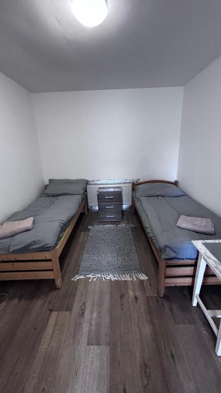 Ένα ή περισσότερα κρεβάτια σε δωμάτιο στο Sleep & Go Praha - západ