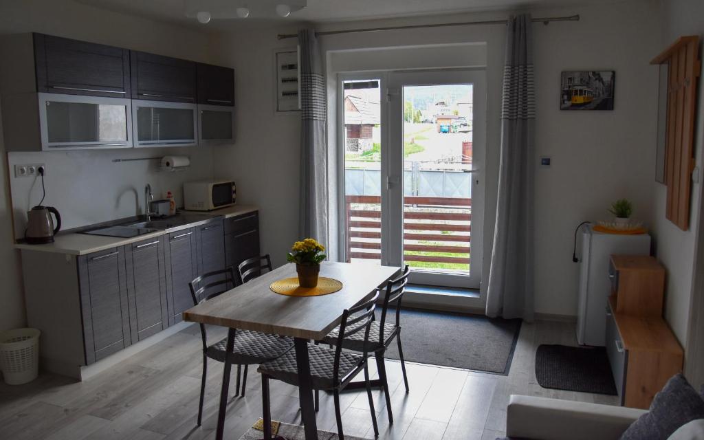 A kitchen or kitchenette at Apartmán u Braňa
