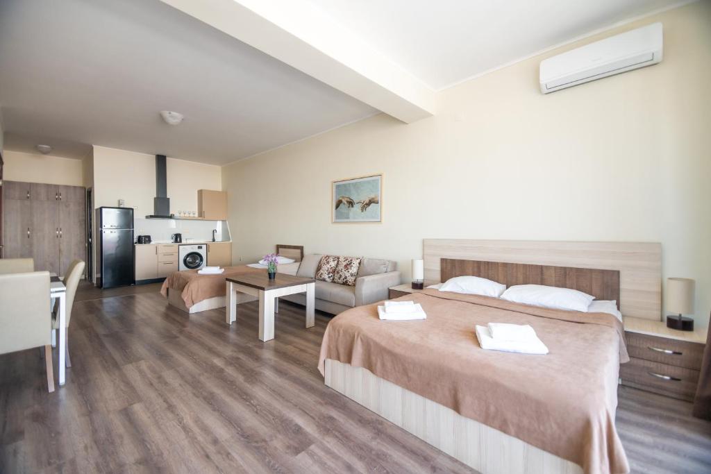 Postel nebo postele na pokoji v ubytování Hotel Mireosi