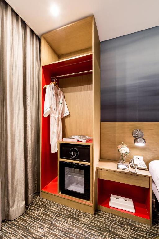 Postel nebo postele na pokoji v ubytování ibis Styles Ambassador Seoul Myeong-dong
