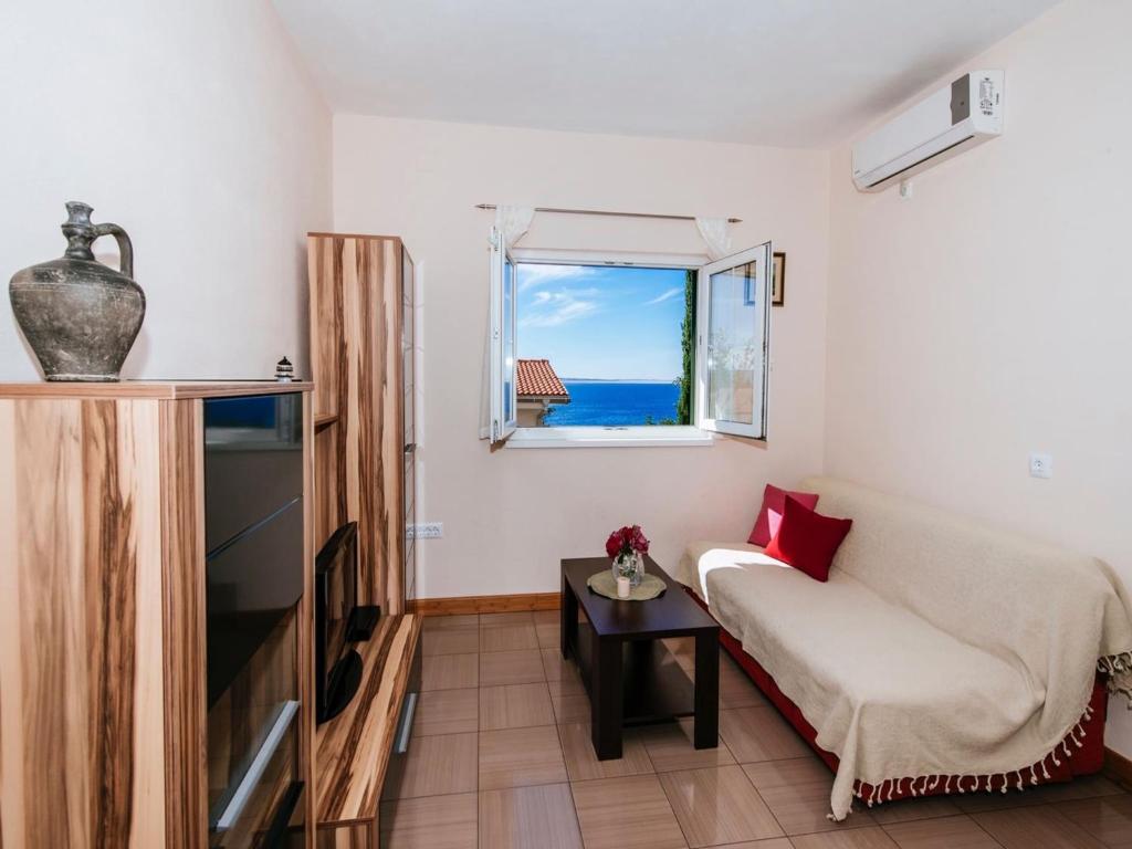 Posedenie v ubytovaní Modern Apartment in Starigrad Paklenica with Barbecue