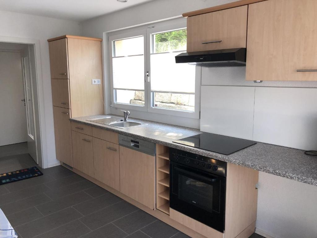 Kuchyň nebo kuchyňský kout v ubytování Ferienwohnung Bäumchenblick