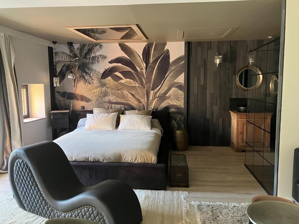 Ένα ή περισσότερα κρεβάτια σε δωμάτιο στο L'Arôme