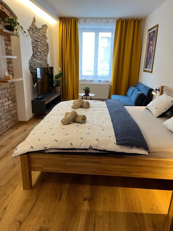 Postel nebo postele na pokoji v ubytování Apartmán Mick Jagger