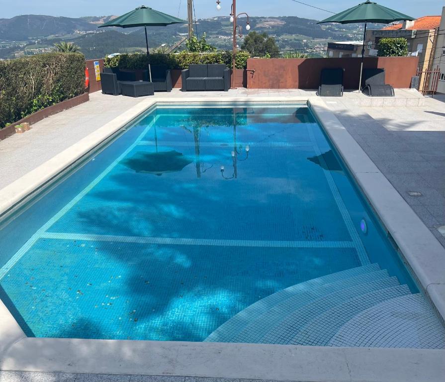 Bazén v ubytování Casa São Domingos nebo v jeho okolí