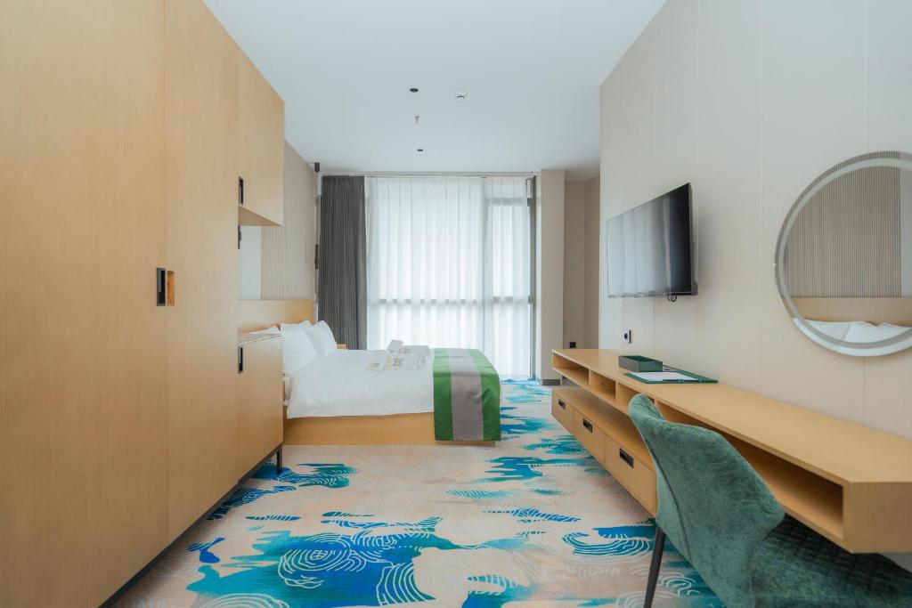 TV a/nebo společenská místnost v ubytování Bliss Palace Hotel & Spa
