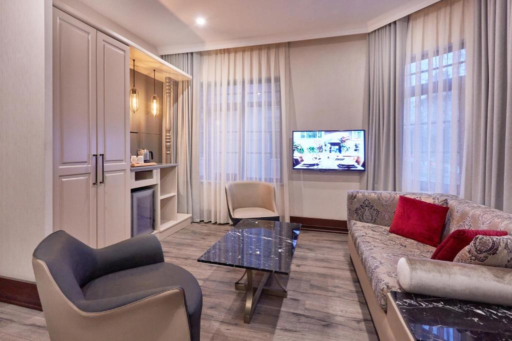A television and/or entertainment centre at Konak Hotel Taksim