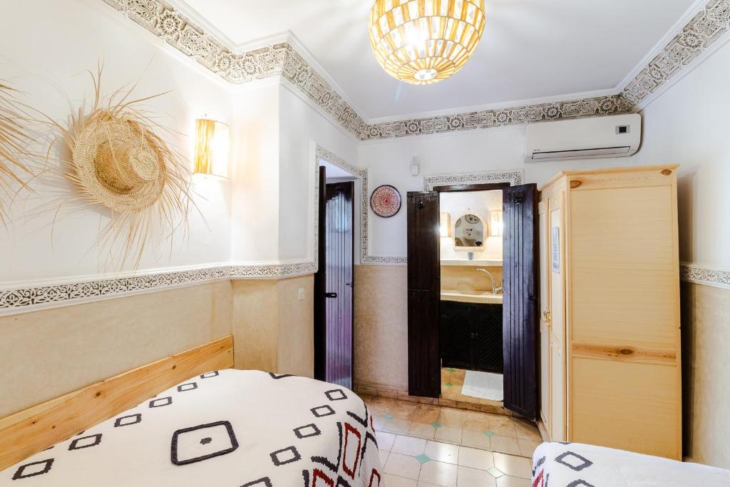 Postel nebo postele na pokoji v ubytování Riad Davina