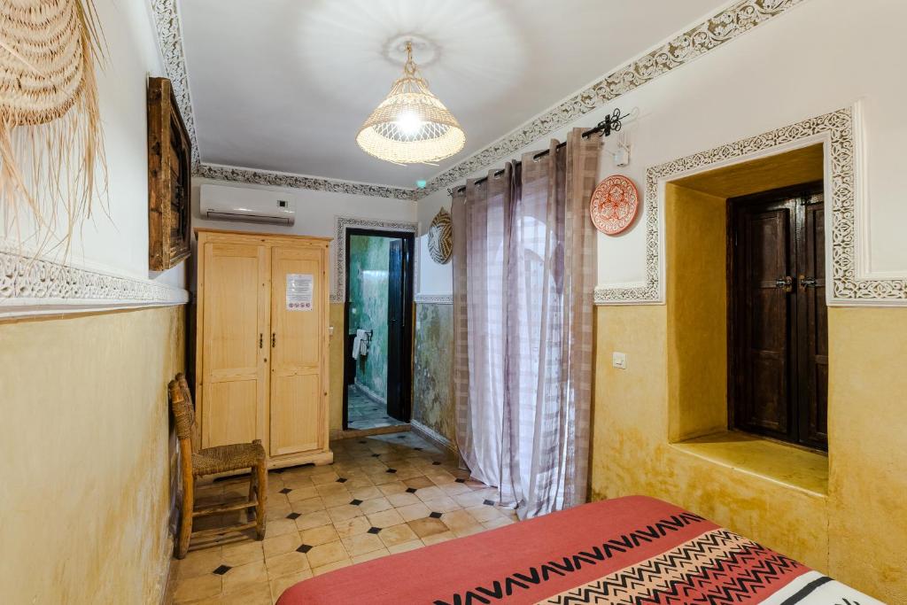 Postel nebo postele na pokoji v ubytování Riad Davina