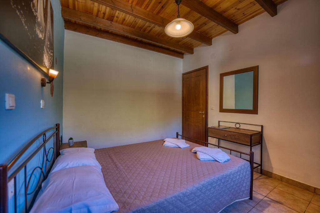 Postel nebo postele na pokoji v ubytování Stefanias Appartments