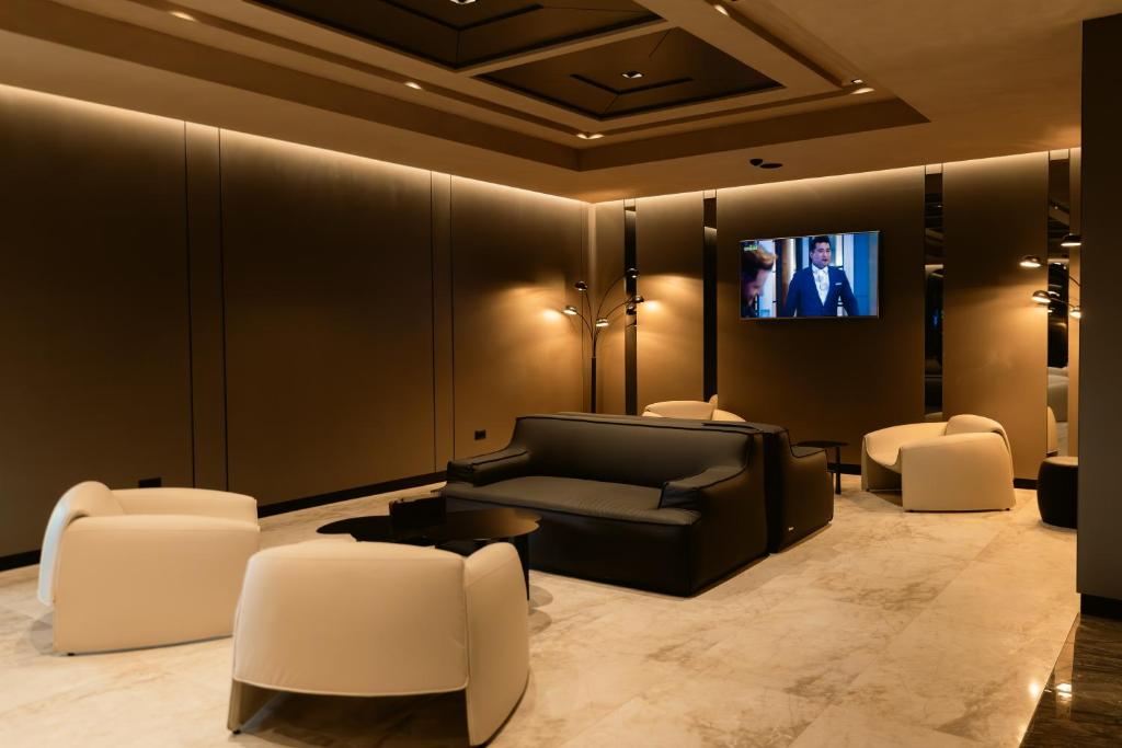 TV a/nebo společenská místnost v ubytování Venus Hotel