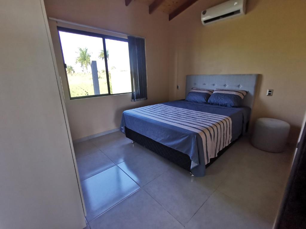Llit o llits en una habitació de SASH-Resort