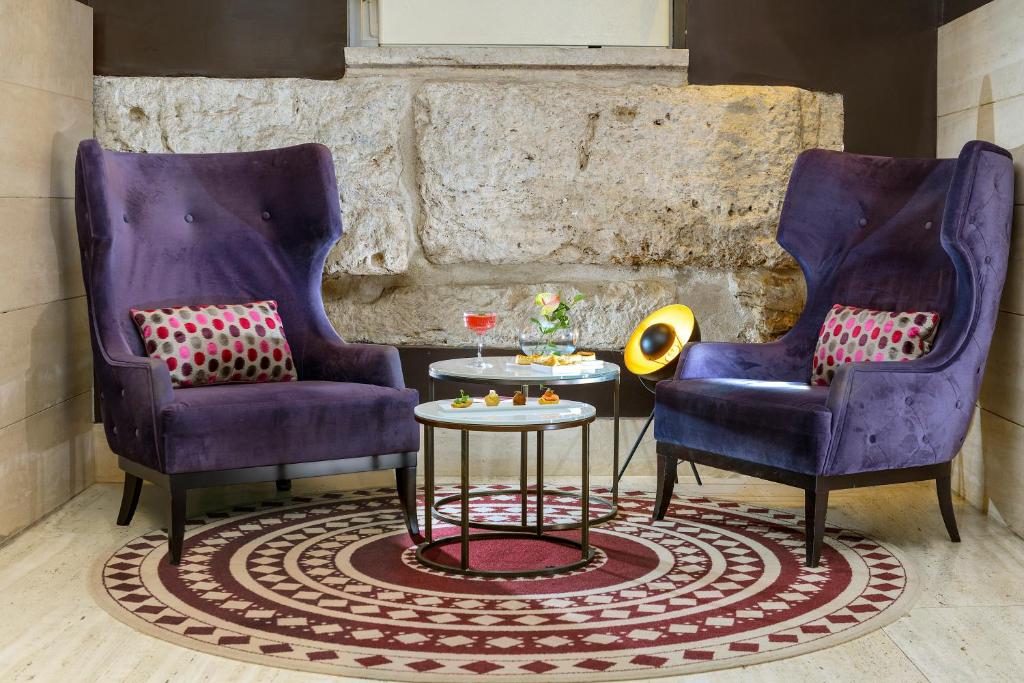 Posezení v ubytování Hotel Indigo Rome - St. George by IHG
