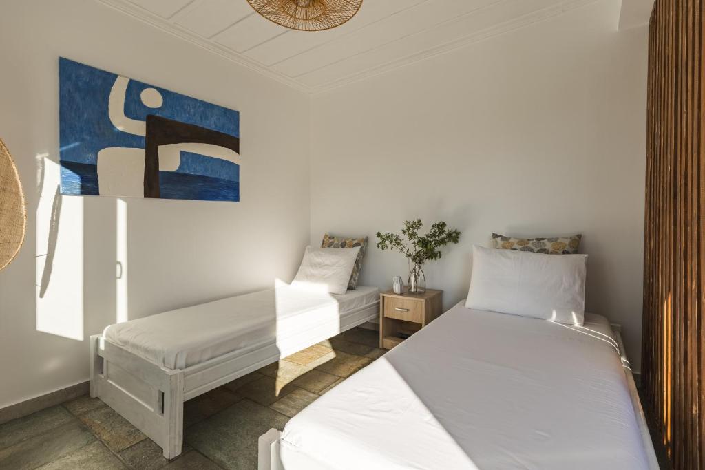Ein Bett oder Betten in einem Zimmer der Unterkunft Binios Villa - private pool, walking distance from the Beach