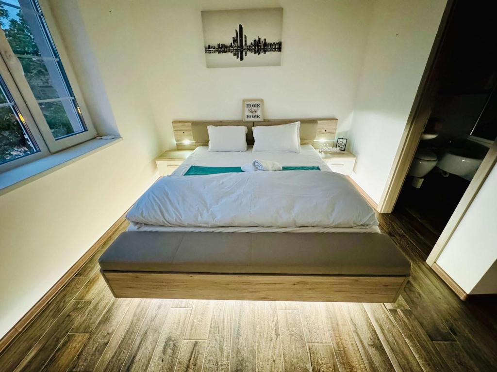 Ένα ή περισσότερα κρεβάτια σε δωμάτιο στο Joy City Stay Nemoianu 13A-8