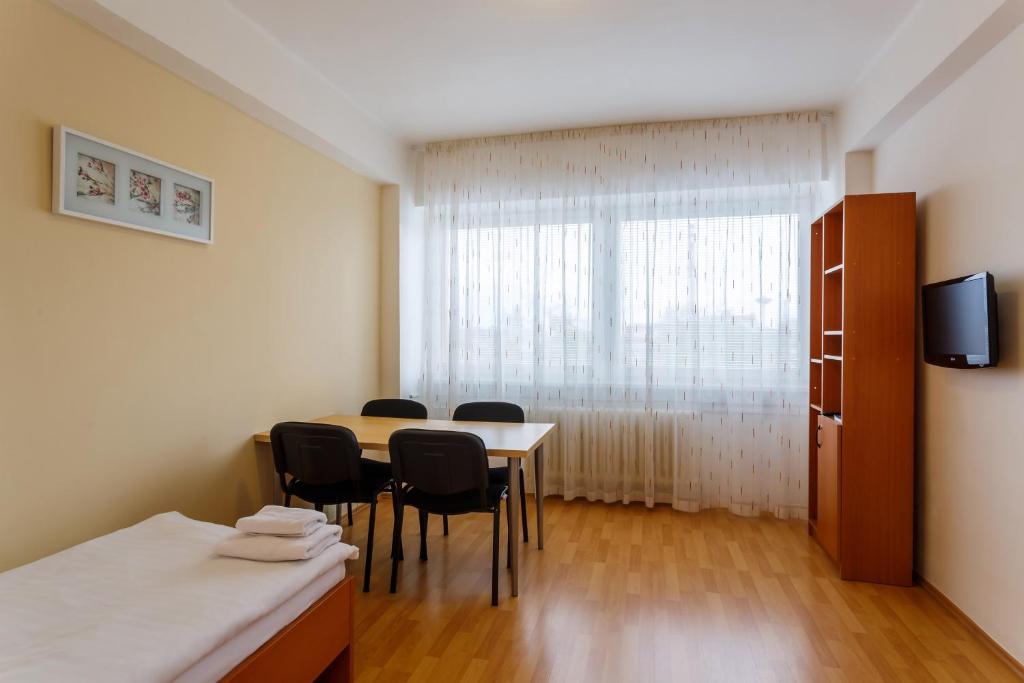 TV a/nebo společenská místnost v ubytování Hotel Veronika