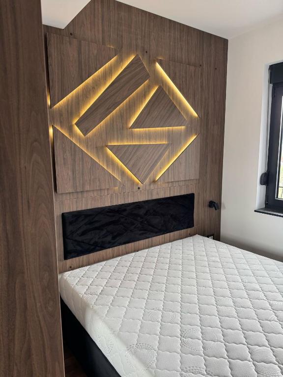 Postel nebo postele na pokoji v ubytování Apartman 53
