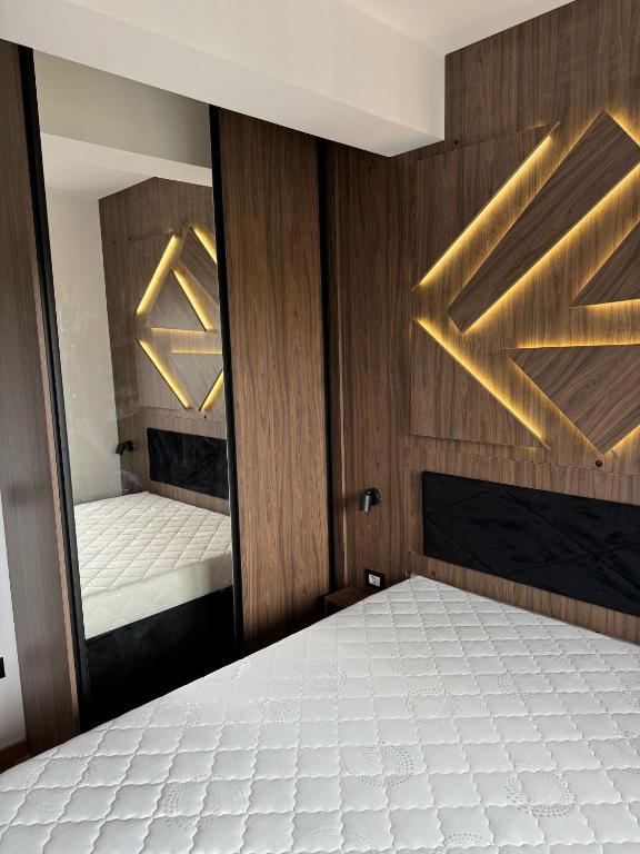 Postel nebo postele na pokoji v ubytování Apartman 53