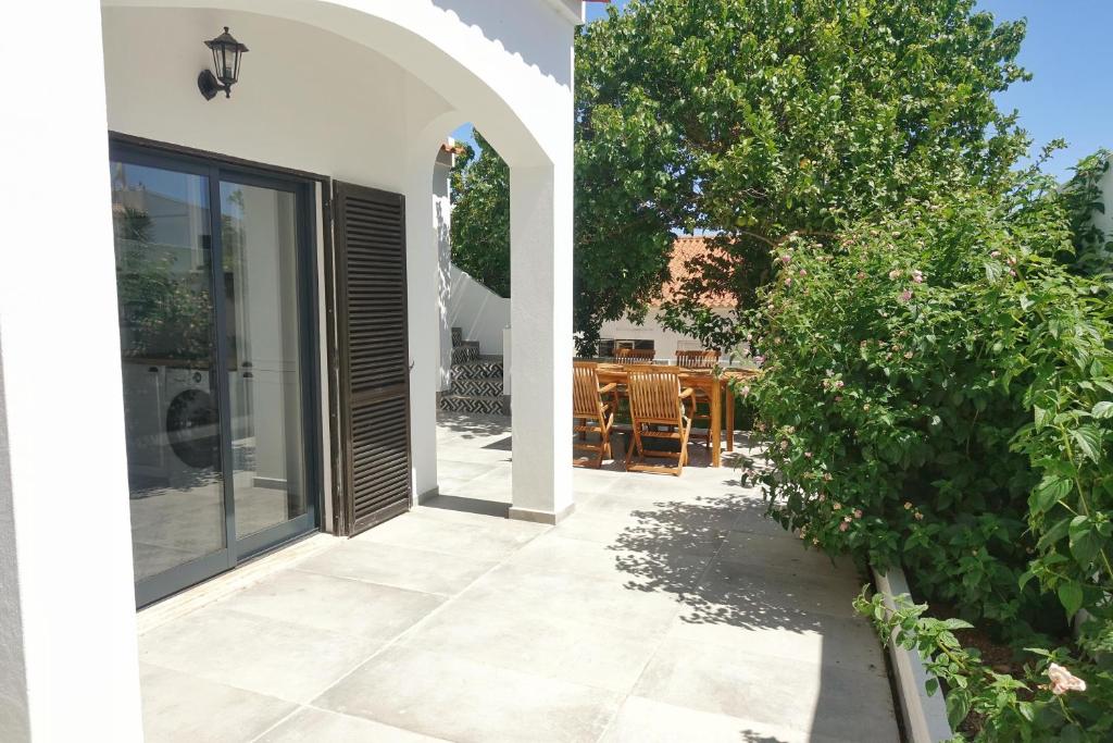 a view of a patio from the outside of a house at Endless Ocean - Praia da Luz in Luz