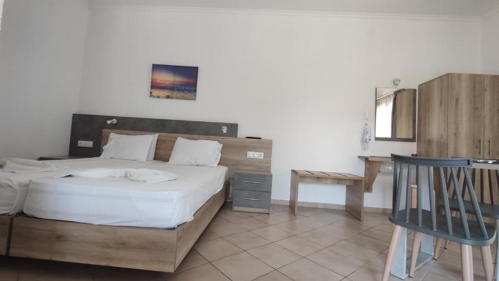 Postel nebo postele na pokoji v ubytování Smaragda Hotel