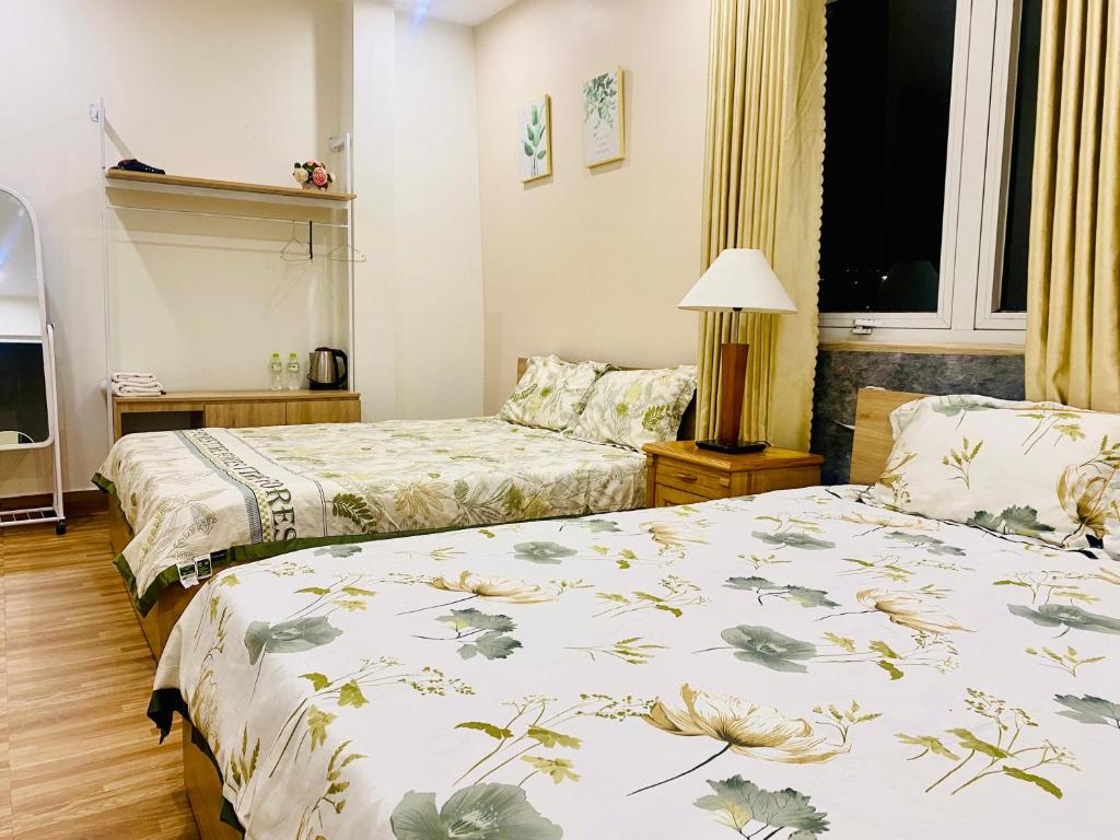 Letto o letti in una camera di Dalat Peace Backpackers Hostel