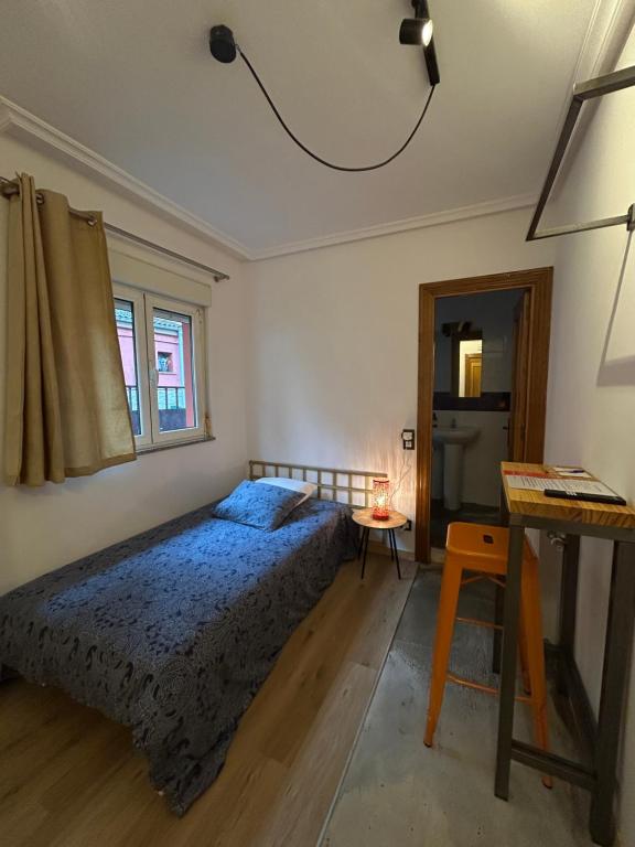 A bed or beds in a room at Lotila Flats Rio Caudal