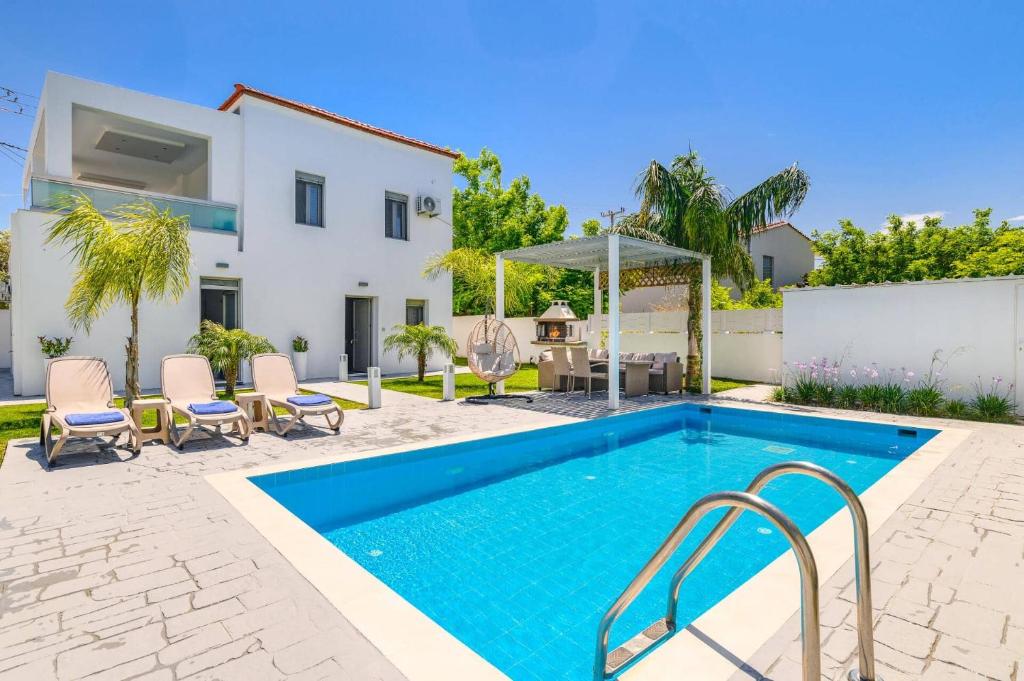 Πισίνα στο ή κοντά στο Villa Costa by Villa Plus