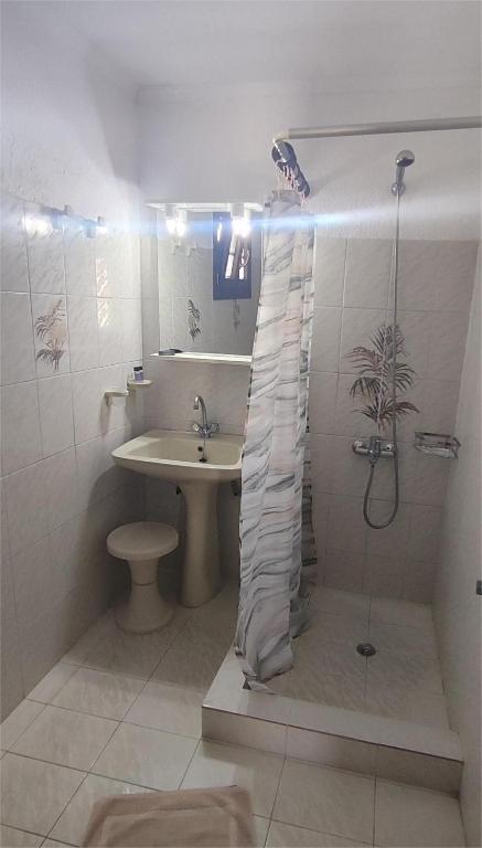 Koupelna v ubytování Smaragda Hotel