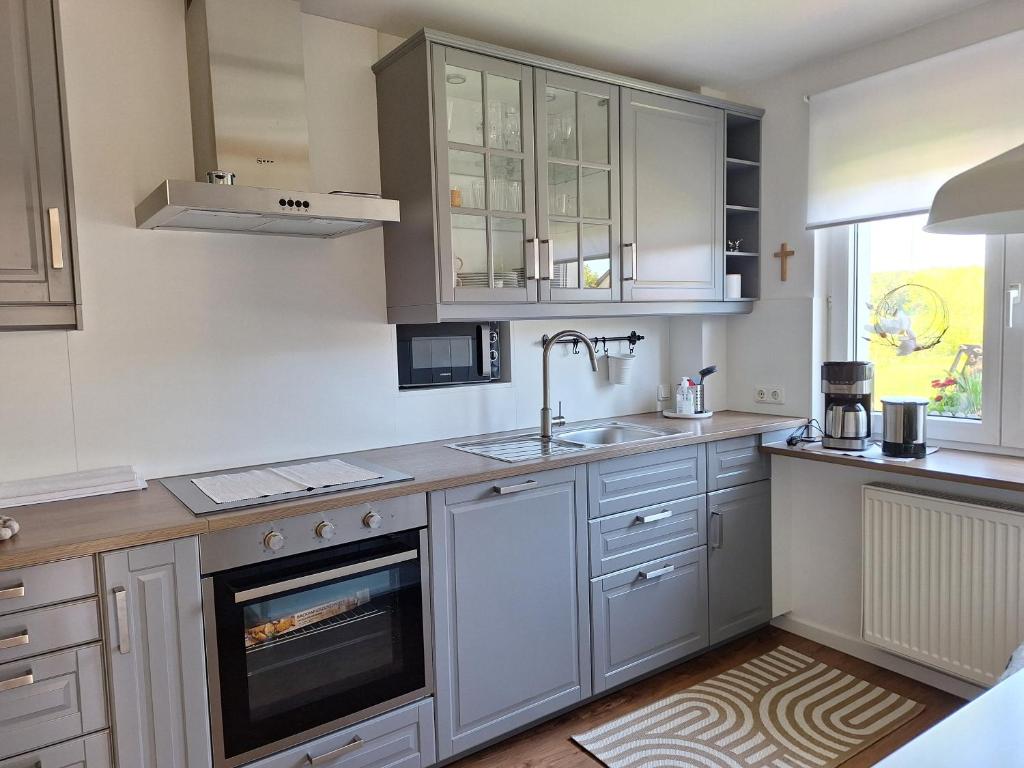 Kuchyň nebo kuchyňský kout v ubytování Ferienhaus Forstblick