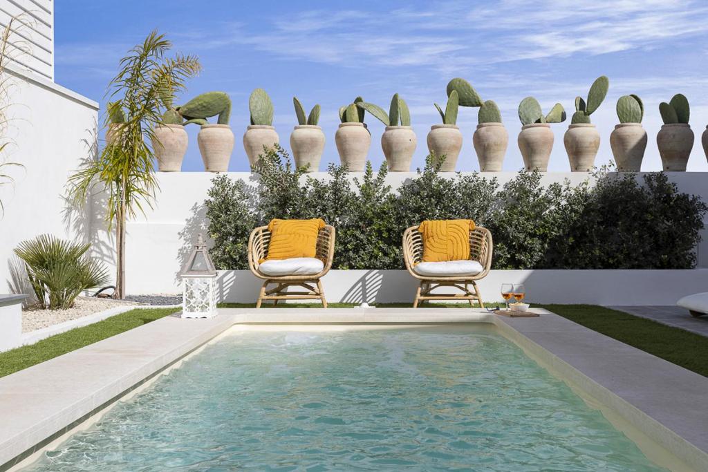 Bazén v ubytovaní Casa un Tocco di Blu con piscina privata alebo v jeho blízkosti