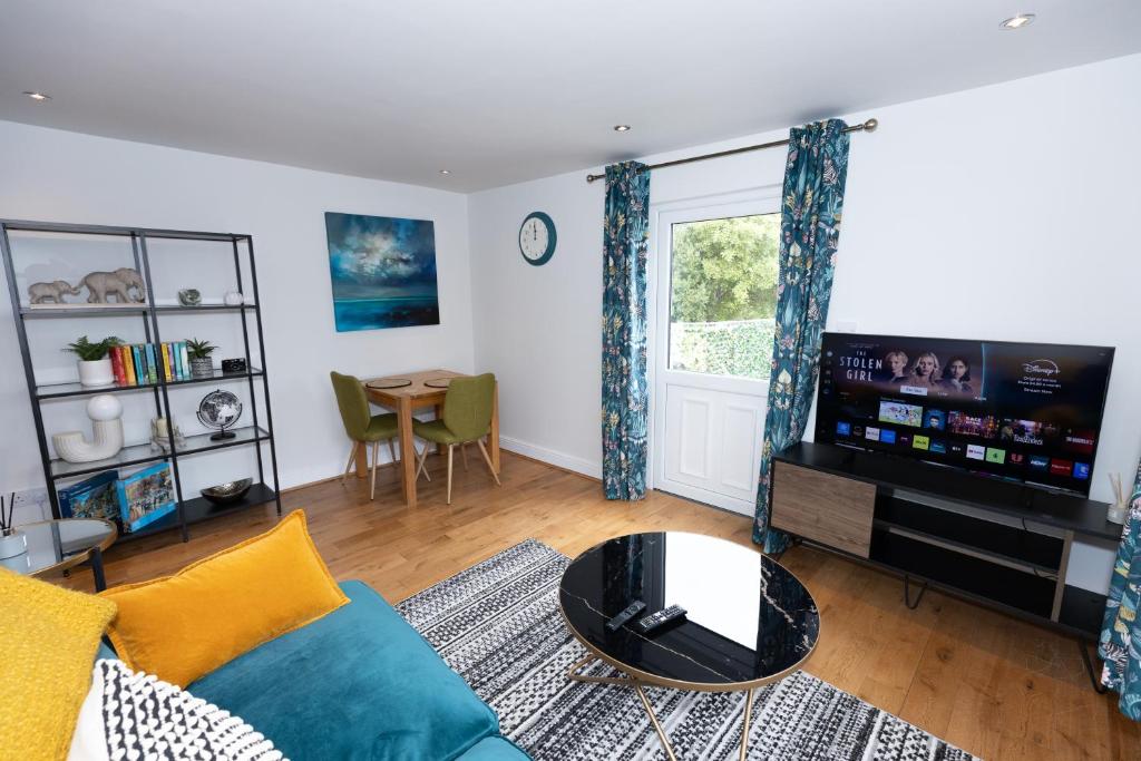 TV a/nebo společenská místnost v ubytování First Class Flat