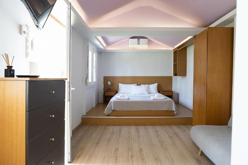 Postel nebo postele na pokoji v ubytování La Palma Beachfront Suites