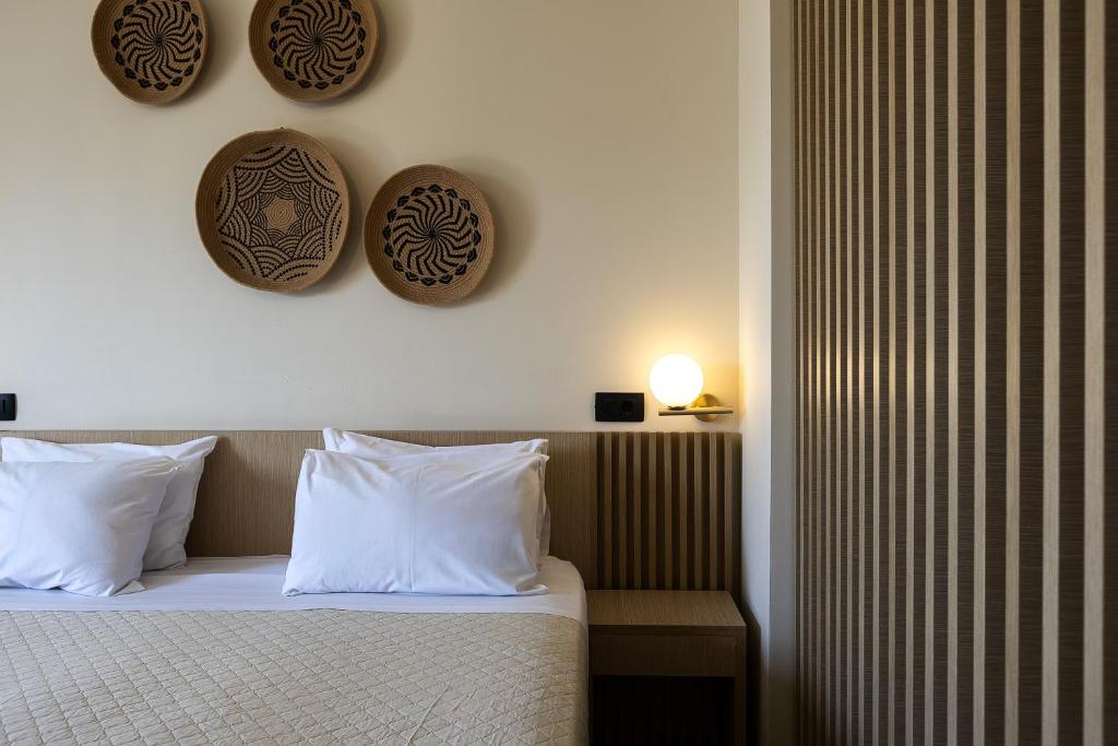 Postel nebo postele na pokoji v ubytování La Palma Beachfront Suites