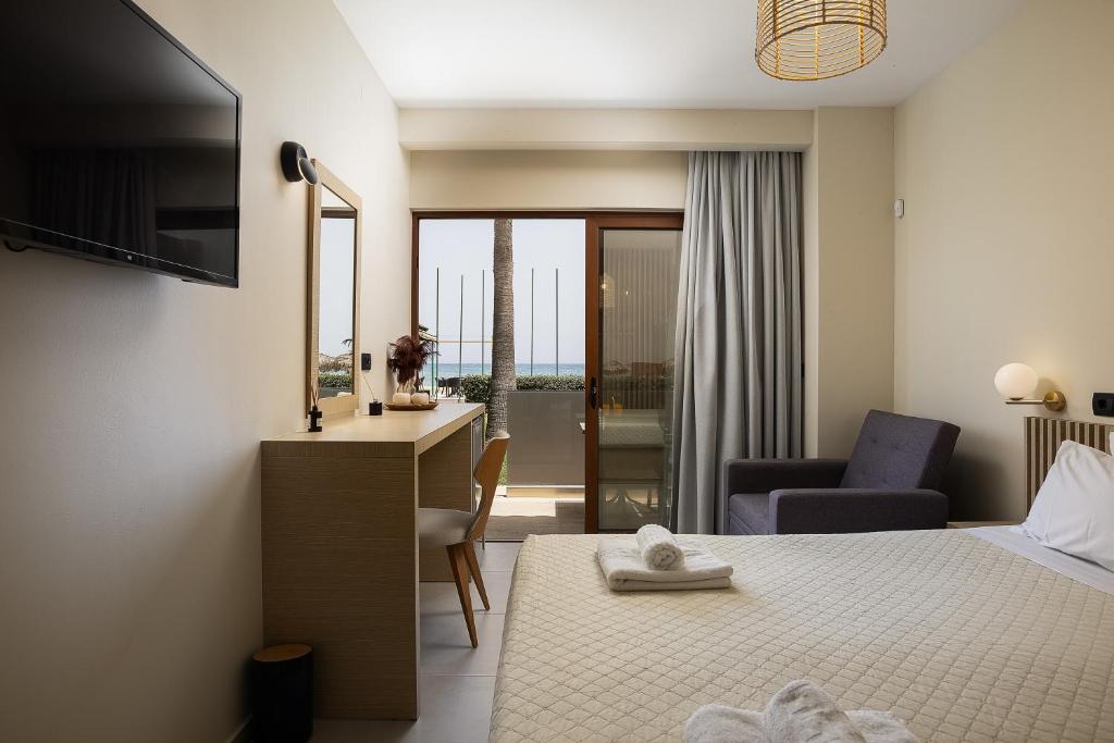 Postel nebo postele na pokoji v ubytování La Palma Beachfront Suites