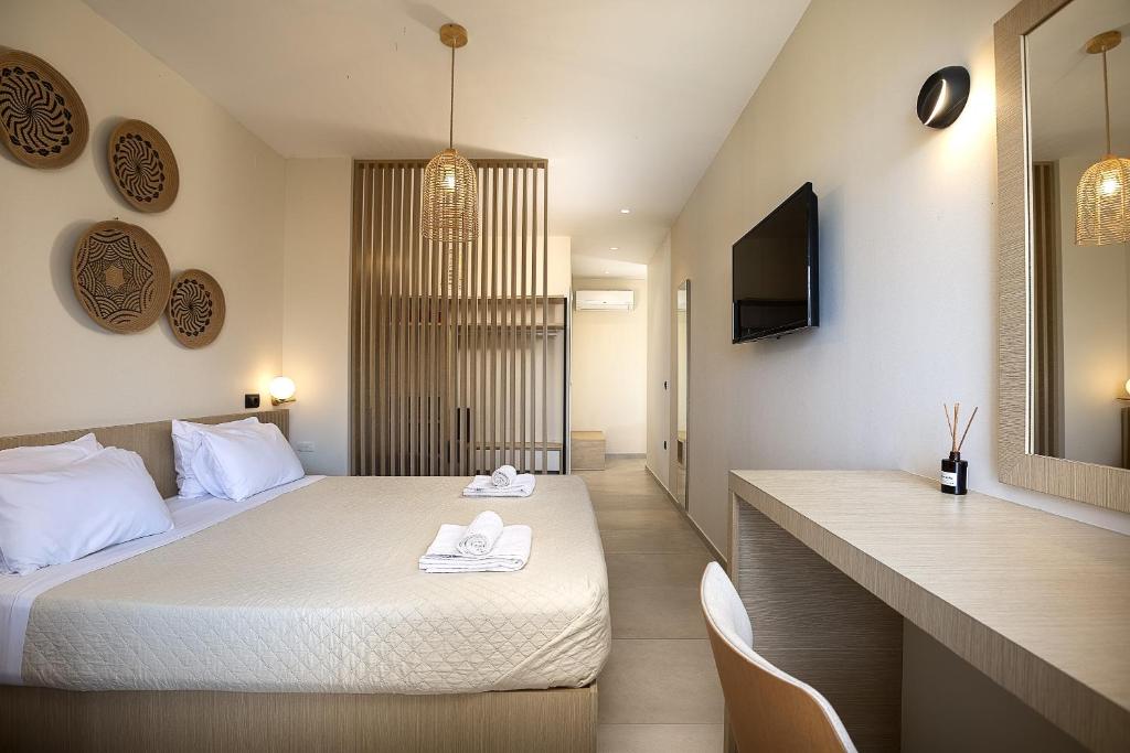 Postel nebo postele na pokoji v ubytování La Palma Beachfront Suites