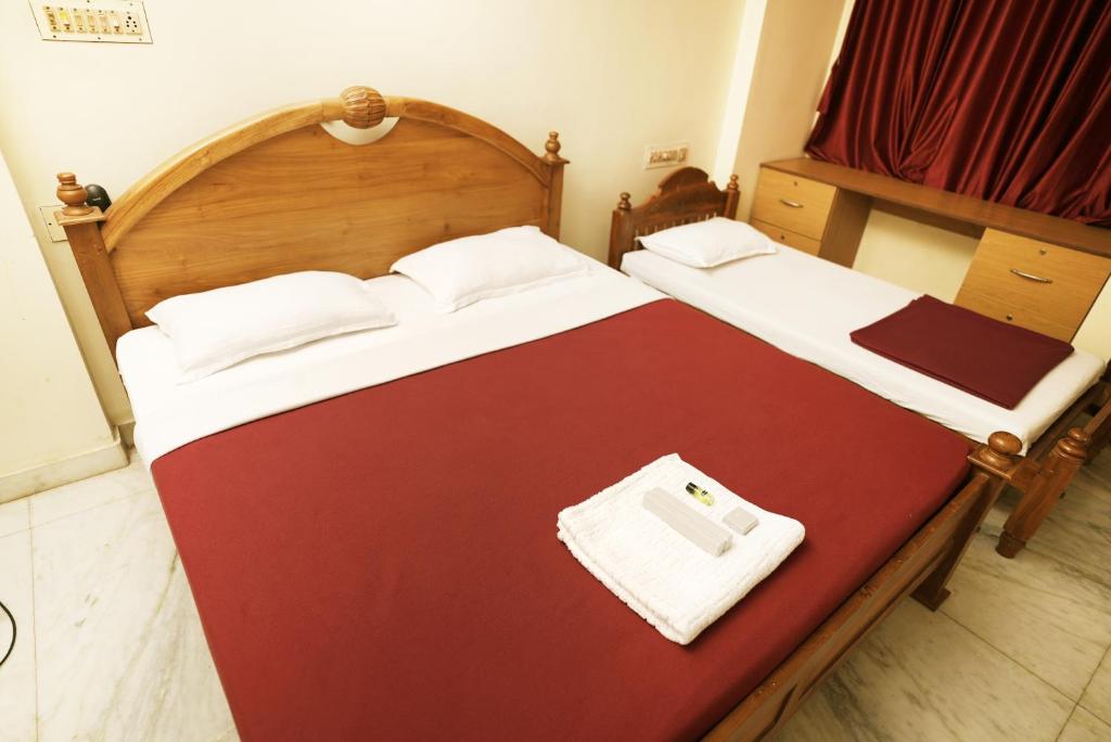 Postel nebo postele na pokoji v ubytování Metropolitan Serviced Villa